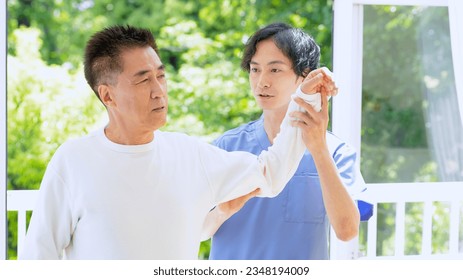 Medical staff treating shoulder pain.