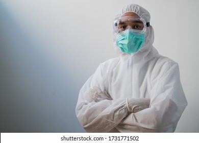 Medical Staff Wearing Face Shield And Medical Mask For Protect Coronavirus Covid-19 And PPE Suit For Coronavirus Outbreak Or Covid-19.