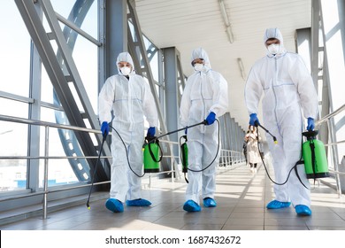 Medical Staff Wearing Protective Clothing Disinfects The Public Place, Pandemic Health Risk