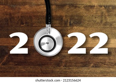 Medical Stethoscope With 2022 Number On Background. Happy New Year For Healthcare,