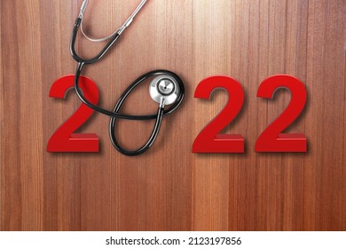 Medical Stethoscope With 2022 Number On Background. Happy New Year For Healthcare,