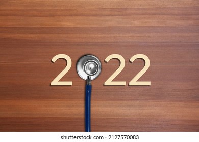 Medical Stethoscope With 2022 Number On Background. Happy New Year For Healthcare,