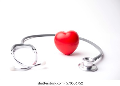 Medical Stethoscope And Heart Isolated On White