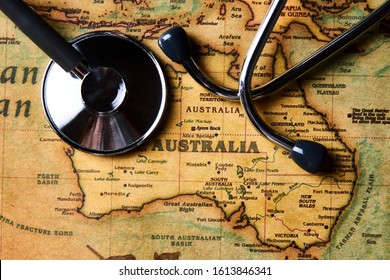 Medical stethoscope over Australia healthcheck. Medical concept tourism travel care diseases healthy, close-up. Australian health care with map and stethoscope