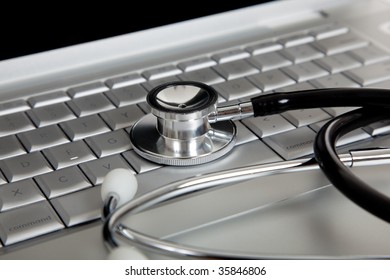 A Medical Stethoscope And A Portable Laptop Computer.  Medical Information And Technology Concept