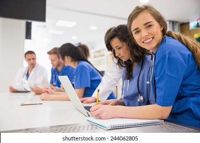 Medical Student Smiling At The Camera During Class At The University