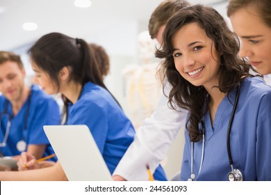 Medical Student Smiling At The Camera During Class At The University