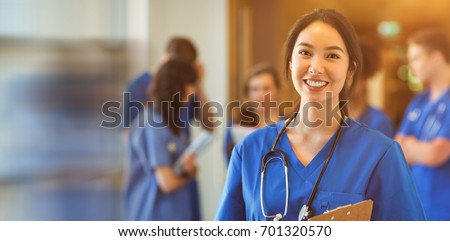 Medical student smiling at camera in university