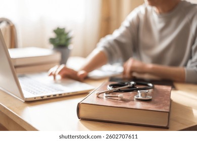 Medical Student Studying Human Anatomy In Modern Library For Advanced Healthcare Education And Research - Powered by Shutterstock - Get 15% off with code: PIKWIZARD15