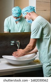 Medical Student Is Washing His Hands Under Running Water. Hygiene For Doctors Before Working With Pacietns. Good Method To Stop Pandemic Of Coronavirus Covid 19
