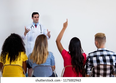 Medical Students Listening To Doctor At Classroom Of University