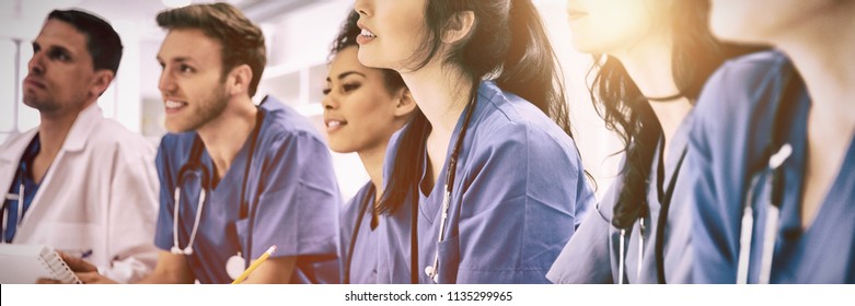 Medical students listening sitting at desk at the university
