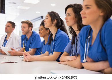 Medical students listening sitting at desk at the university