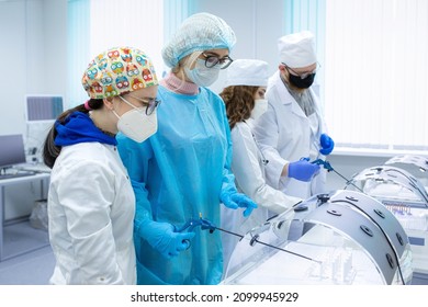 Medical Students Practice Laparoscopy Surgery With A Teacher On A Modern Simulator. Training Of Surgeons.