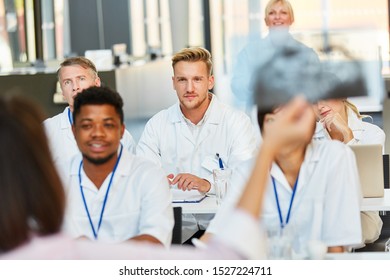 Medical Students In A Radiology Seminar Look At An X-ray