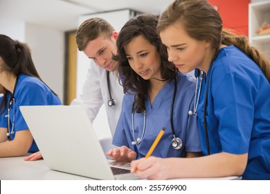 Medical students sitting and talking at the university