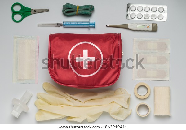 Medical supplies from
a red first aid kit
