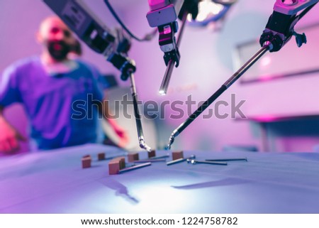 Medical surgical room healthcare intelligence in hospital with robotic innovation technology equipment, machine arm surgeon in futuristic operation room. Minimal invasive bariatric surgical inovation