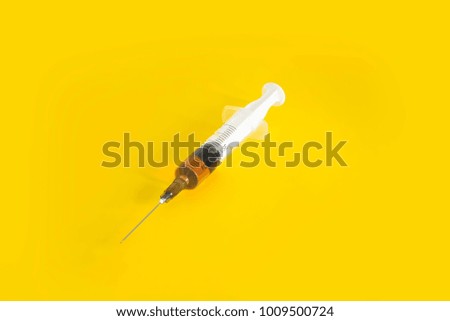 Similar – Medical syringe on colorful background.