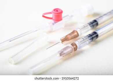 Medical Syringes And Cannula. Hospital Treatment Accessories. Light Background.