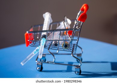 Medical Syringes In A Shopping Cart