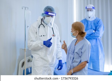 Medical team has been Victory. Doctor & nurse team just recovered patient in hospital. Recovering patient win virus Covid-19 outbreak. Health Insurance, happy patient, teamwork concept. - Powered by Shutterstock