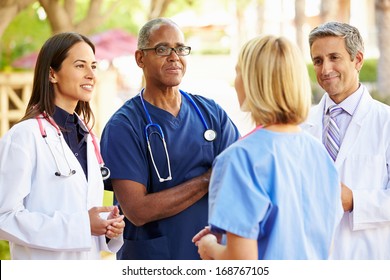 Medical Team Having Discussion Outdoors