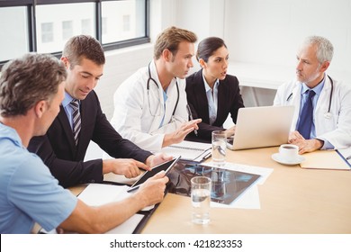 Medical Team Having A Meeting In Conference Room In Hospital