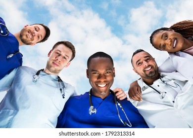 Medical Team Huddle And Staff Group Unity