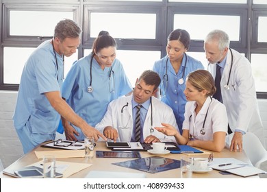 Medical team interacting at a meeting in conference room