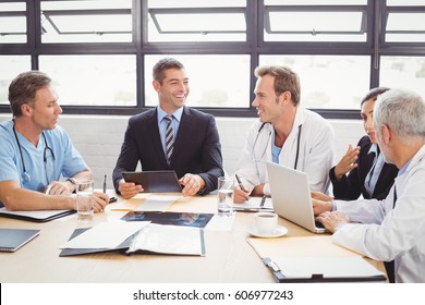 Medical team interacting at a meeting in conference room