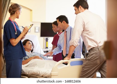 Medical Team Meeting Around Female Patient Stock Photo 168812606 ...