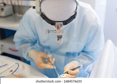 Medical team of surgeons in hospital doing minimal invasive surgical interventions. Surgery operating room with electrocautery equipment for cardiovascular emergency surgery center.
 - Powered by Shutterstock