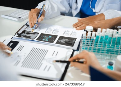 Medical team working on digital tablet healthcare doctor technology tablet using computer analyzed the results of medical reports at the hospital.	 - Powered by Shutterstock