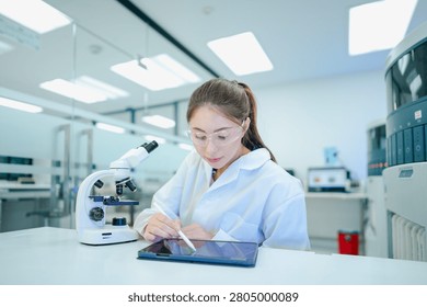 Medical technologist validating automated analyzer results against microscopic observations. Biomedical engineer configuring diagnostic instrument parameters using digital control interface.