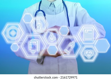 Medical technology concept. Doctor and illustration of different icons on turquoise background - Shutterstock ID 2161729971
