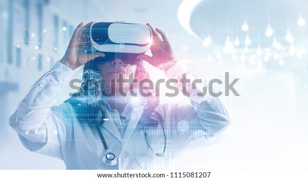 Medical technology concept. Mixed media.\
Female doctor wearing virtual reality glasses. Checking brain\
testing result with simulator interface, Innovative technology in\
science and medicine.\
