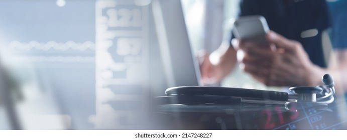 Medical technology, health background. Doctor working on laptop monitoring electronic health record in hospital, online medical, e-health, copy space for website banner - Powered by Shutterstock