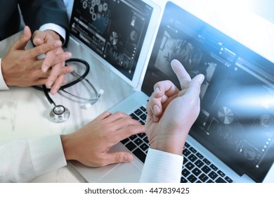 Medical Technology Network Team Meeting Concept. Doctor Hand Working Smart Phone Modern Digital Tablet Laptop Computer Graphics Chart Interface, Sun Flare Effect Photo