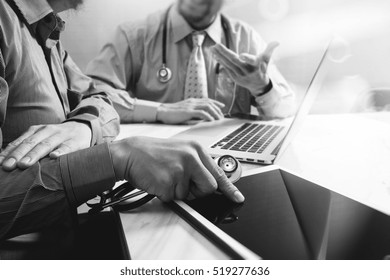 Medical Technology Network Team Meeting Concept. Doctor Hand Working Smart Phone Modern Digital Tablet Laptop Computer Graphics Chart Interface, Black White Photo