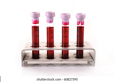 Medical Test Tubes With Blood In Holder On White Background