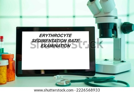 Medical tests and diagnostic procedures concept. Text on display in lab Erythrocyte Sedimentation Rate Examination