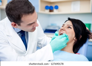 Medical treatment at the dentist office. - Powered by Shutterstock