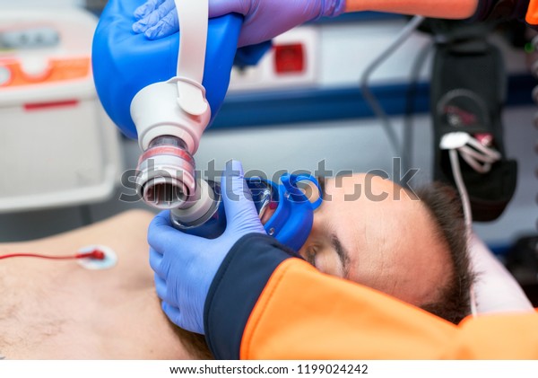 Medical urgency in the ambulance.\
Cardiopulmonary resuscitation using hand valve mask\
bag