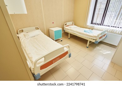 medical ward in a hospital with two beds - Shutterstock ID 2241798741