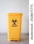 Medical waste bin. Biohazard contaminated waste sign symbol trash garbage bin.	
