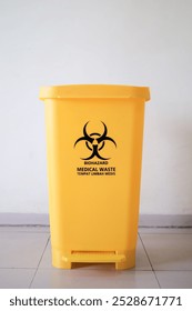 Medical waste bin. Biohazard contaminated waste sign symbol trash garbage bin.	
