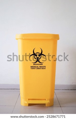 Medical waste bin. Biohazard contaminated waste sign symbol trash garbage bin.	
