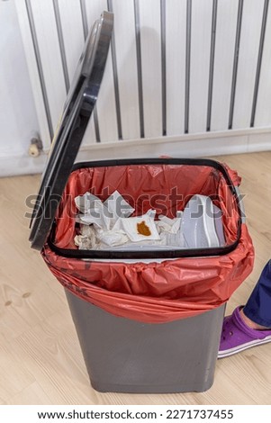 Medical waste dustbin. Infectious waste should be thrown into the garbage bag and red in hospitals. PPE is managing infectious waste.