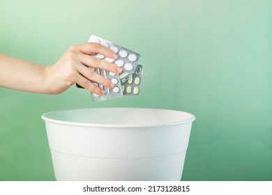 medical waste processing, expired pills are thrown into the bin, copy space